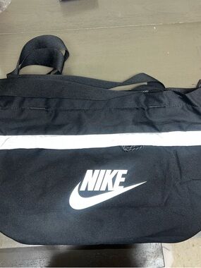 Nike Black Duffel Bag with White Logo and Stripe